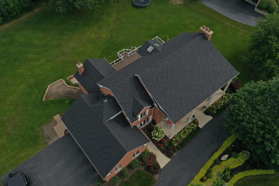 Aerial view of the black roof of the house